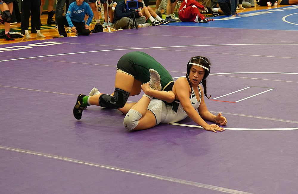 Sara Penate Tercero of Katy Mayde Creek, eventual 125 lb. champion by major decision