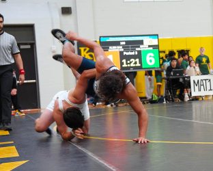 190 lb. Champion Caelan Fletcher of Bryan is flying to get the win.
