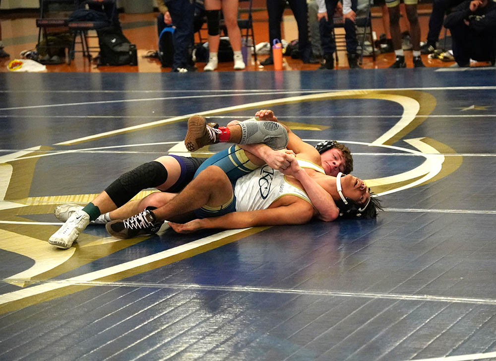 James Colvin (CS) pinning Giovanni Hernandez (KC)