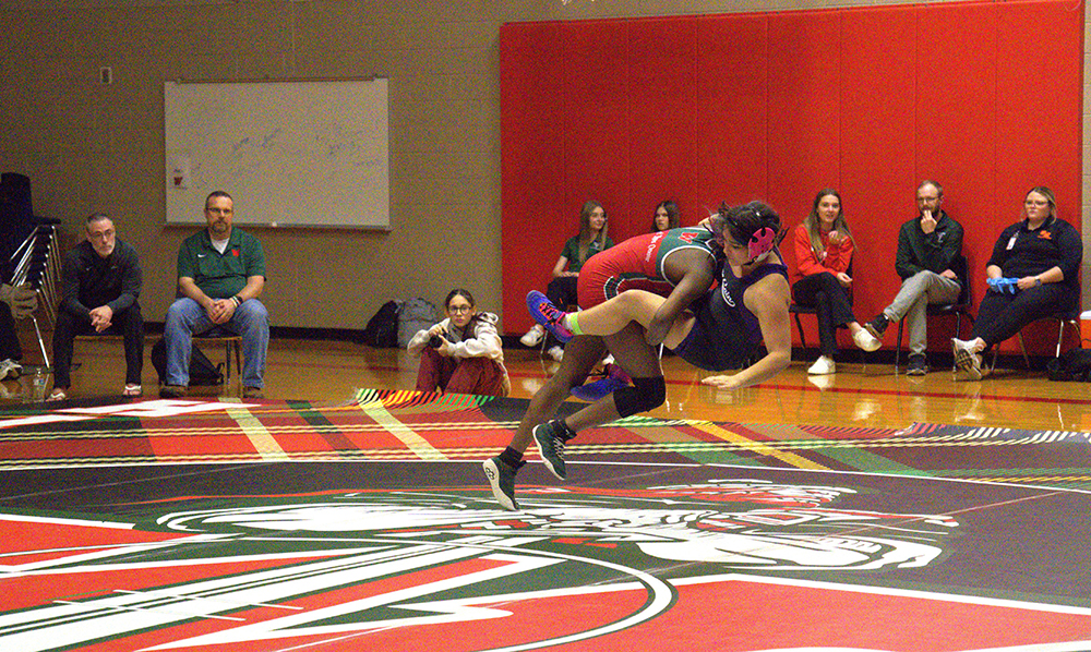 Ojo with a takedown