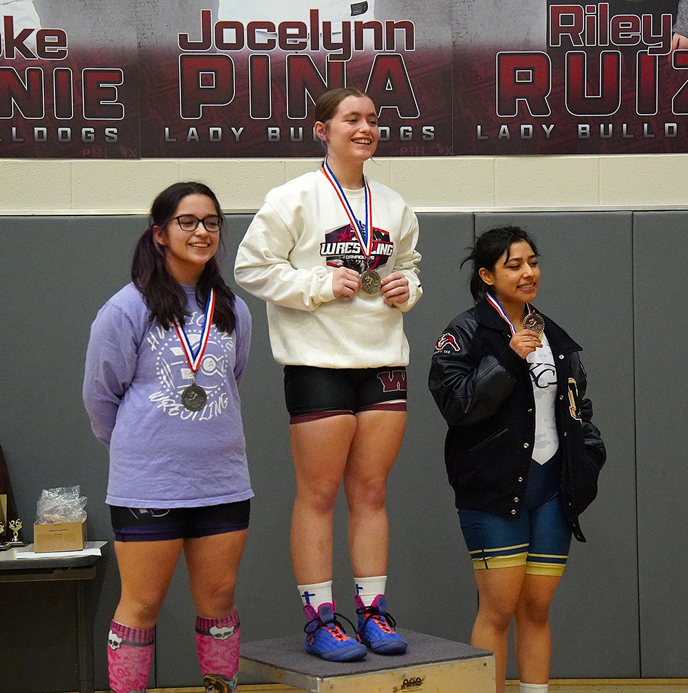 Emma Moye, Waller, 140 lb. Champion