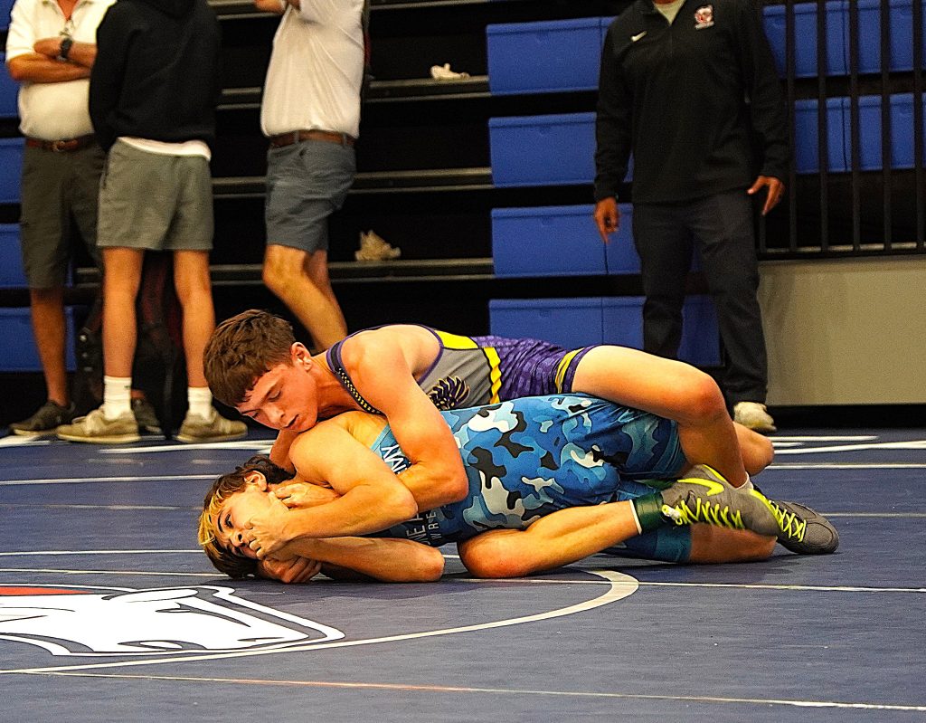 113 lb. Champ- Carl Weidner of Civic Memorial HS (Illinois) in control of Zaiden Hernandez