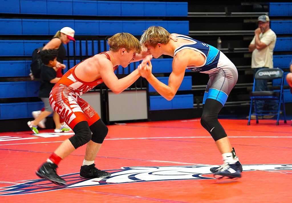 120 lb. Champ- Lou Keneson of Howe Wrestling(Crown Point HS, Indiana) ties up with Nick Payne of Boneyard Academy (College Park HS)
