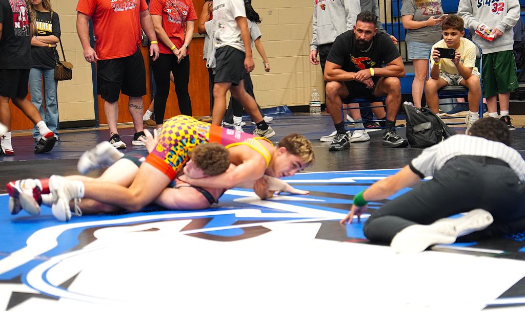 150 lb. Champ- Vinny Ferrari of Cardinal Wrestling (Melisa HS) putting finishing touch on Kye Owen, Caney Creek HS