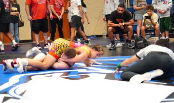150 lb. Champ- Vinny Ferrari of Cardinal Wrestling (Melisa HS) putting finishing touch on Kye Owen, Caney Creek HS